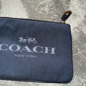 New Coach denim wristlet with inside pocket and outside closure turn lock